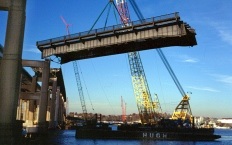 Crane lifting bridge section